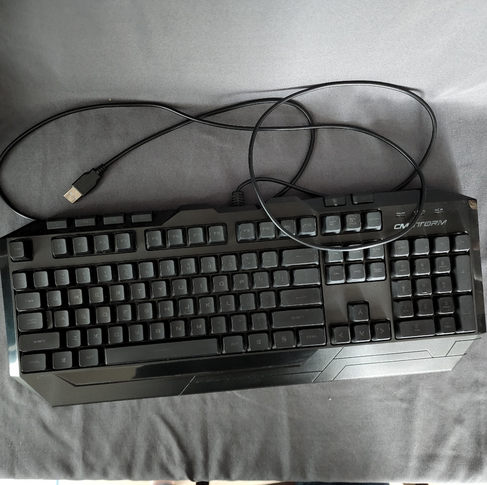 Red Dragon gaming keyboard with red lights